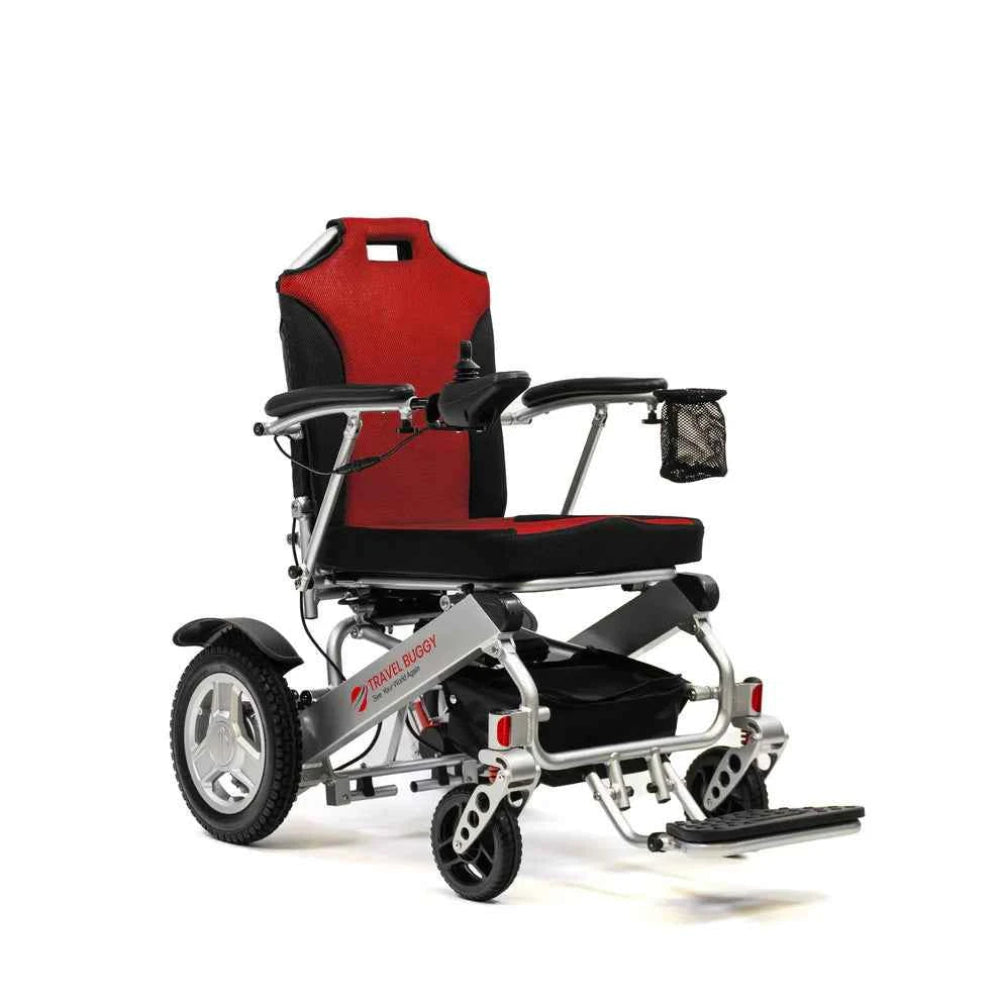 Left angle view of the Travel Buggy CITY 2 PLUS power chair standing out with bold red cushions.