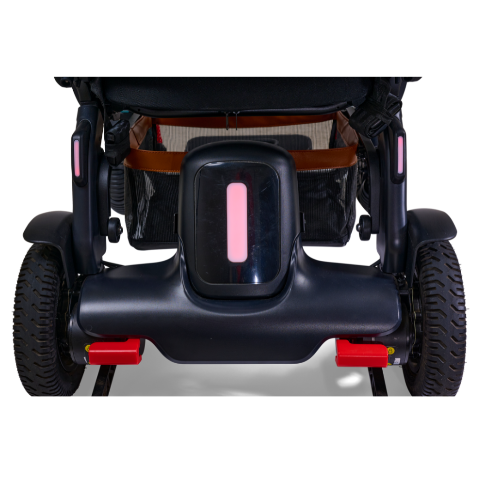 Rear folded view of the Golden Ally Pro GP304 power chair showcasing the integrated red safety taillight.