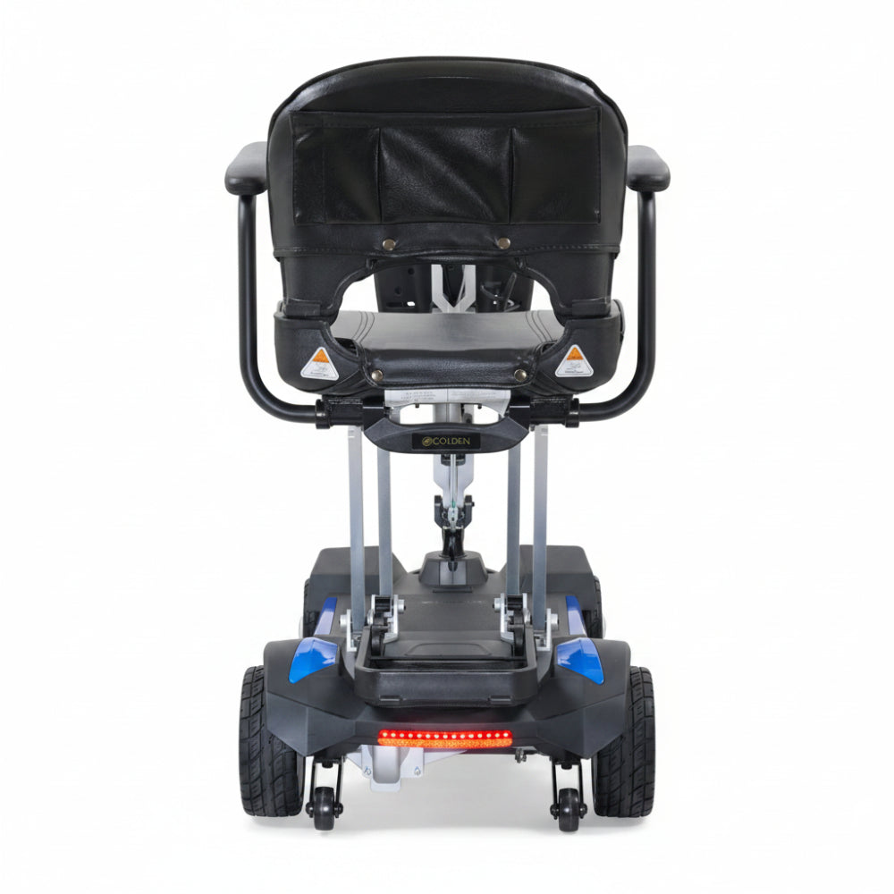 Rear view of the blue Buzzaround CarryOn mobility scooter showing the sturdy wheelbase and backrest.