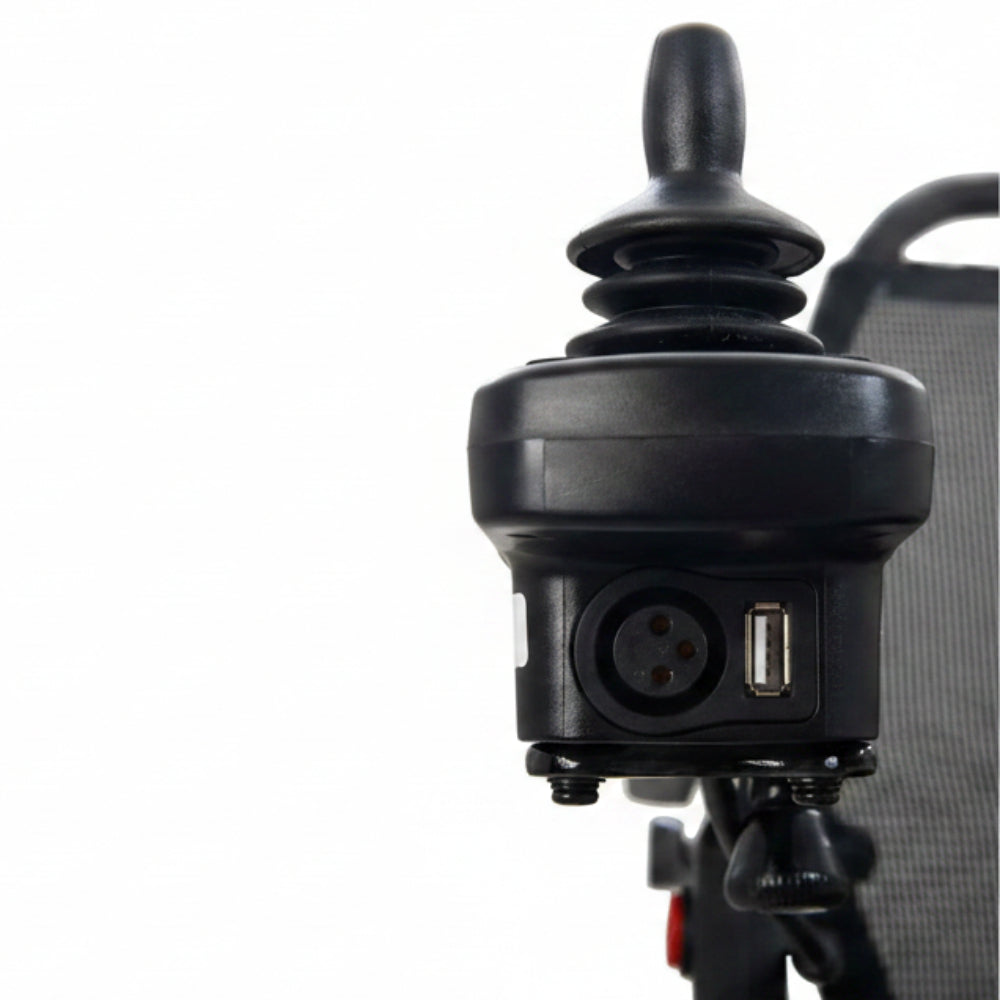Close-up of the Golden Cricket GP302 joystick with its charging port and USB port