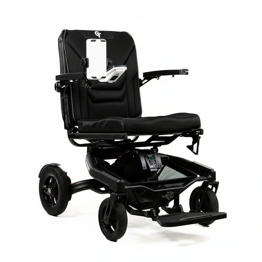 Angled view of the Travel Buggy GT power chair highlighting the comfortable seating and intuitive joystick placement.