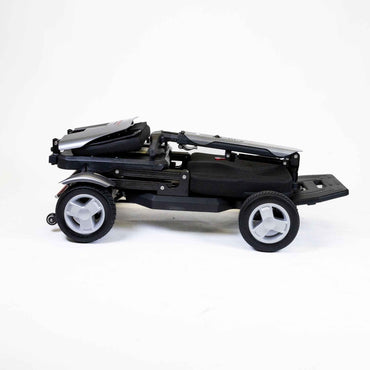 Compact folded Travel Buggy HELIX mobility scooter for easy transport – CareMade