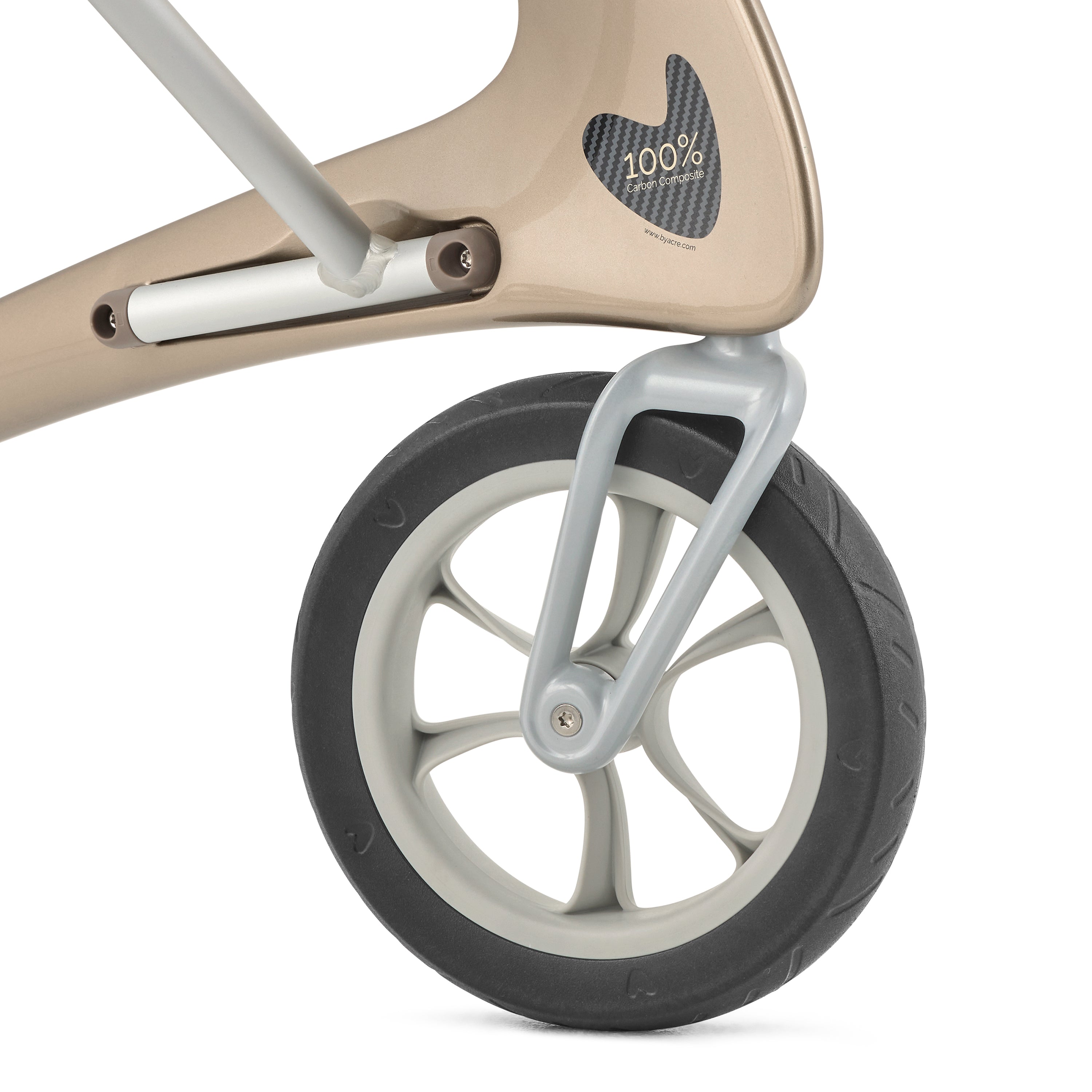 Close up of the Champagne Gold byACRE Carbon Ultralight front wheel and carbon fiber frame