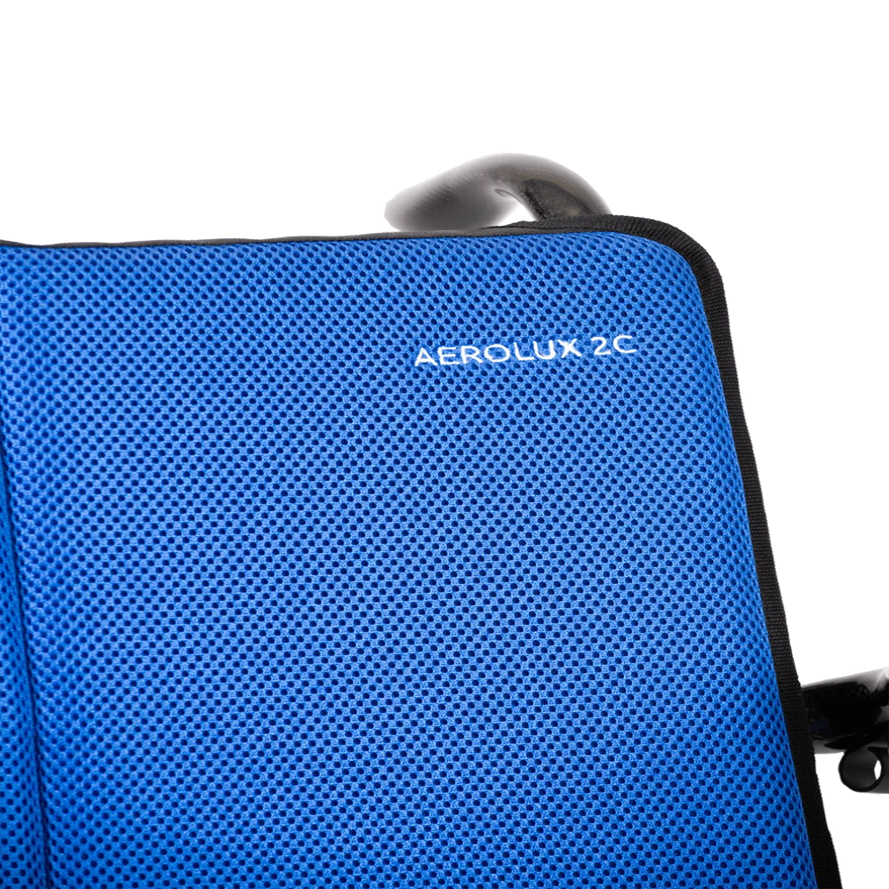 Detailed texture of the deep blue breathable cushion fabric for the AEROLUX 2C power chair.