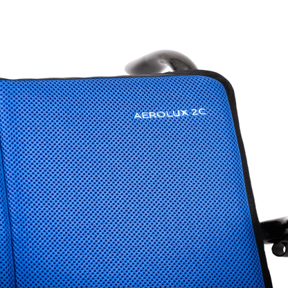 Detailed texture of the deep blue breathable cushion fabric for the AEROLUX 2C power chair.