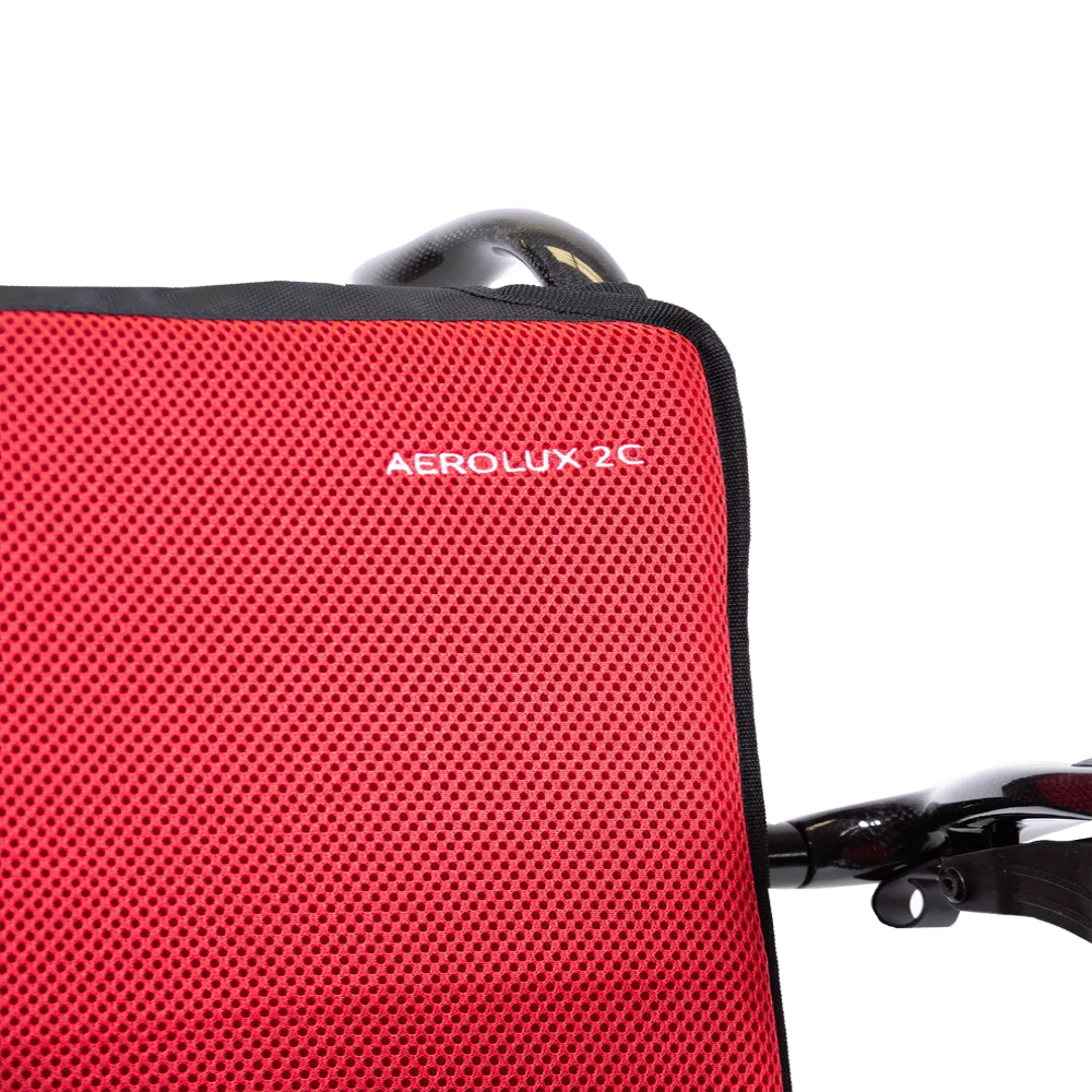 Close-up of the breathable vibrant red fabric used on the Travel Buggy AEROLUX 2C cushions.