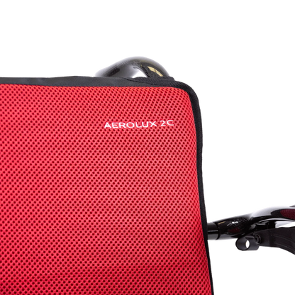 Close-up of the breathable vibrant red fabric used on the Travel Buggy AEROLUX 2C cushions.
