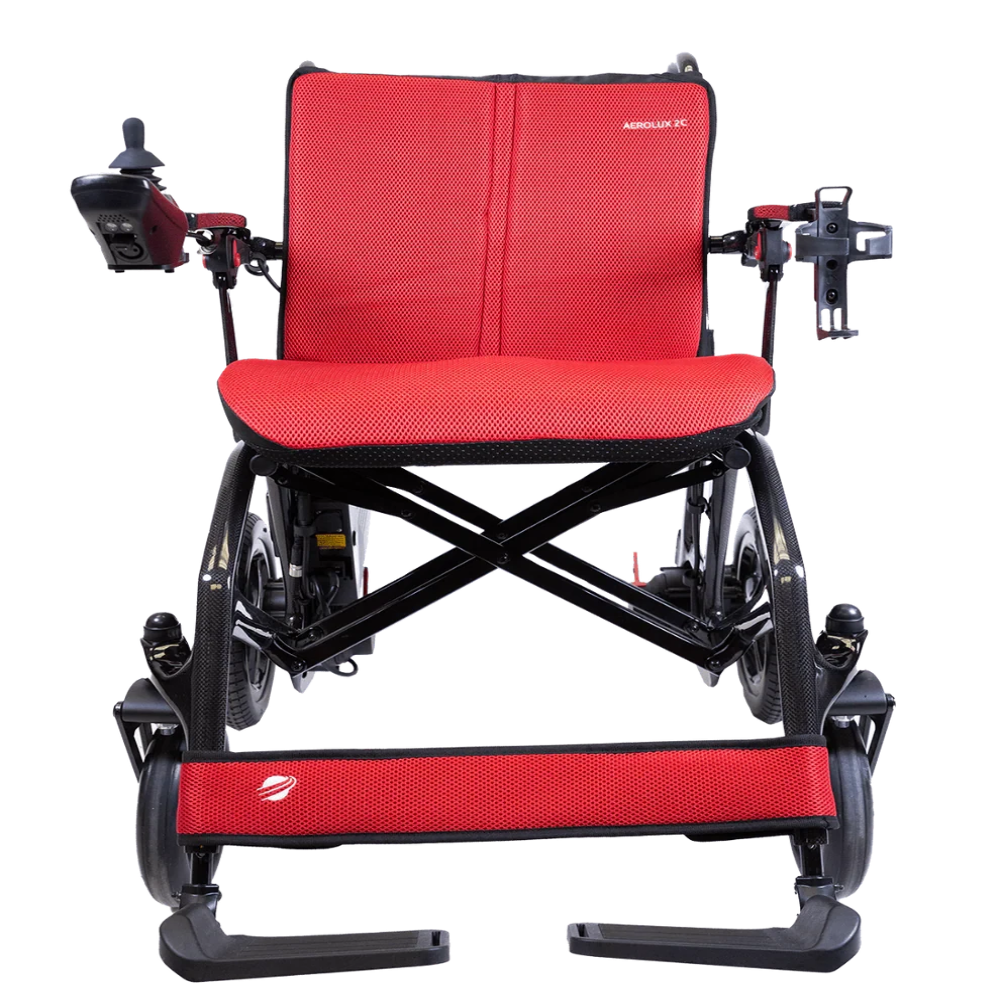 Front view of the AEROLUX 2C power chair featuring the vibrant red replacement cushion set.
