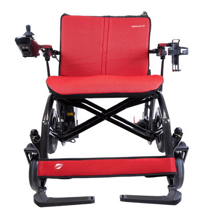 Front view of the AEROLUX 2C power chair featuring the vibrant red replacement cushion set.