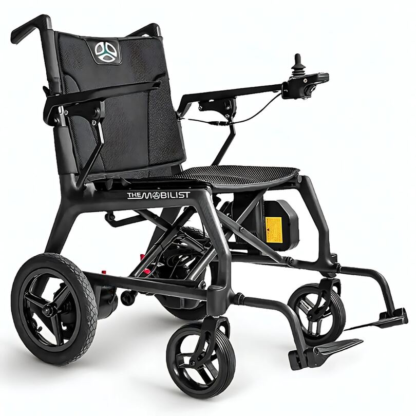 Angled view of the black Airflyer carbon fiber electric wheelchair by The Mobilist featuring a lightweight frame and joystick controller.