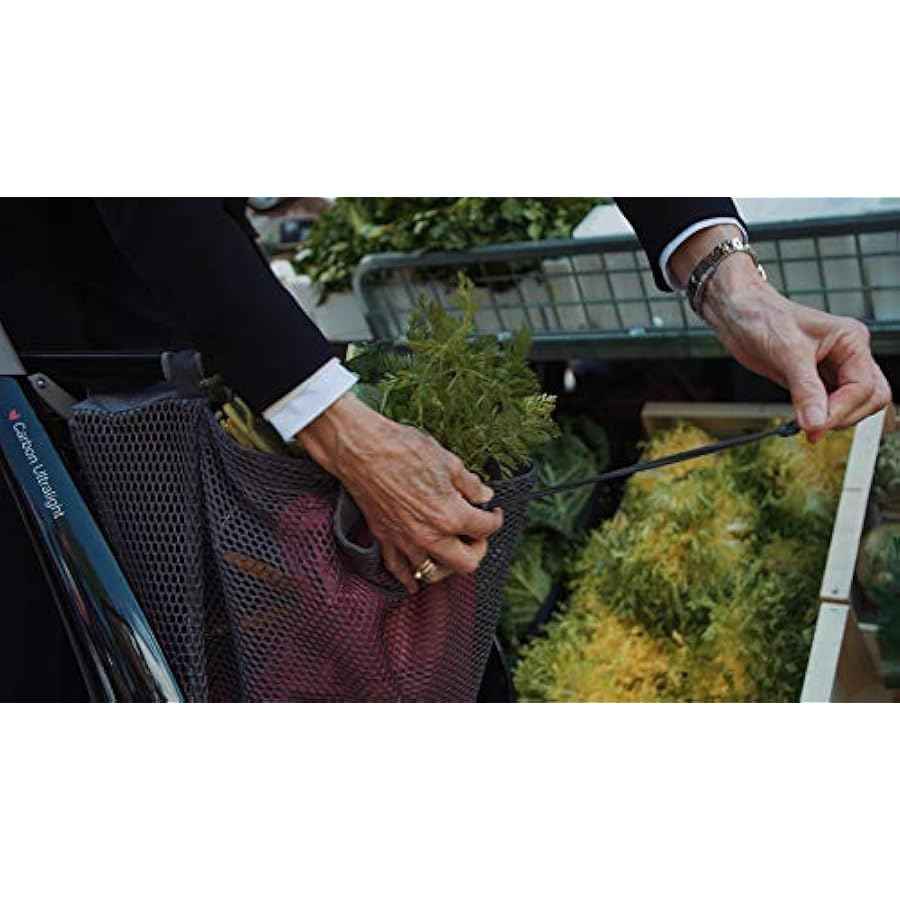 Person carrying the detached byACRE 15 L Grocery Bag