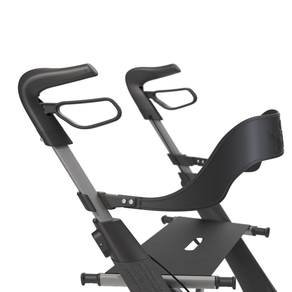 Close-up angled view of the ergonomic black byACRE Nordic Pioneer backrest securely mounted to a black rollator frame for sustainable outdoor seat support.