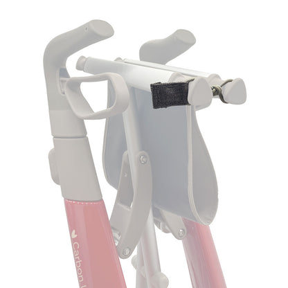 Close-up detail showing the byACRE Travel Lock securely fastened through the frame of a white Carbon Ultralight rollator, providing essential theft deterrence.