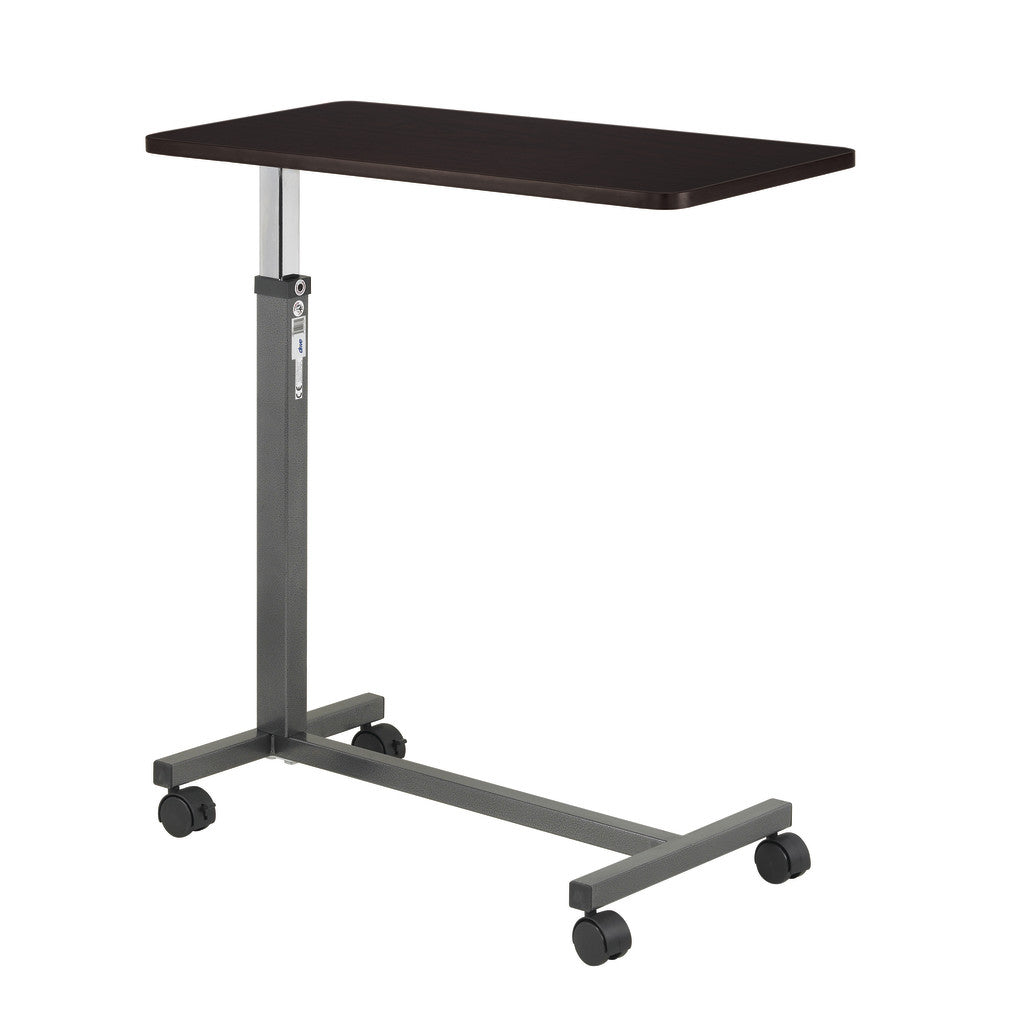 Drive Medical 13067 non-tilt overbed table, walnut woodgrain top and Silver Vein H-base, complete three-quarter view