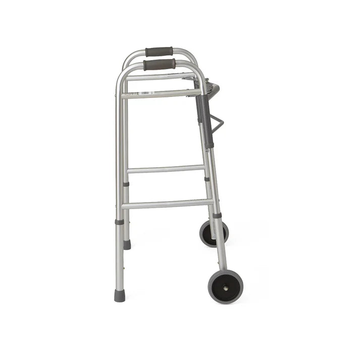 Side profile of the Care Made folding walker with wheels, showcasing its stable, height-adjustable aluminum frame.