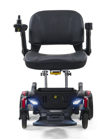 Golden Buzzaround CarryOn GP130 power chair, complete front view with headlights illuminated