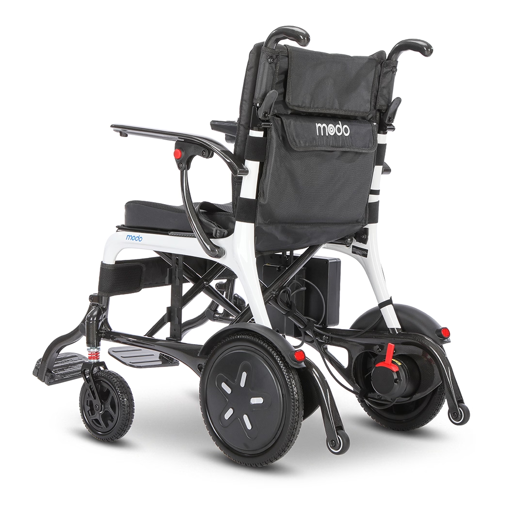 WHILL MODO Breeze carbon-fibre folding power wheelchair, complete rear three-quarter studio view