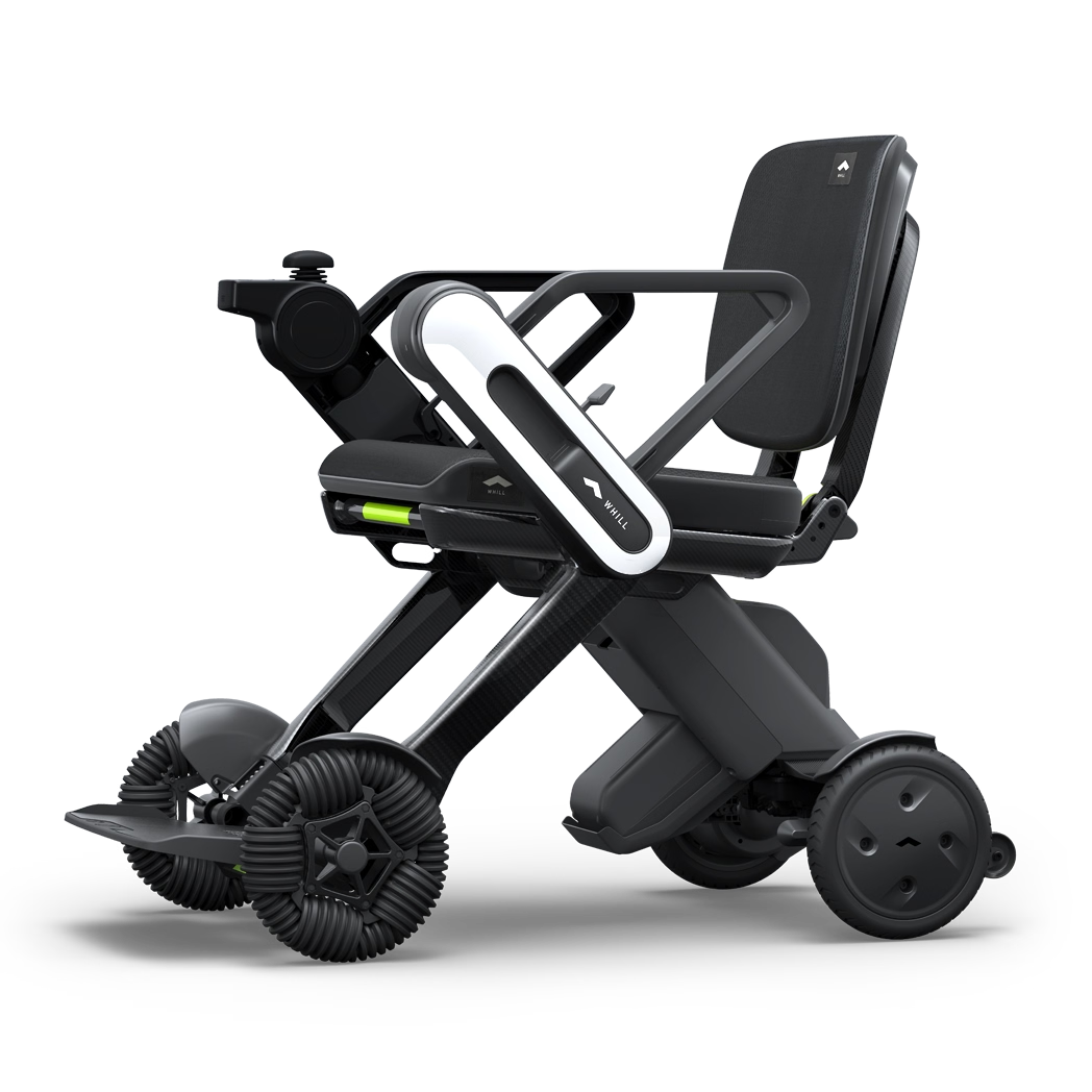 WHILL Model C Lite carbon power wheelchair with white arm covers, complete front three-quarter studio view