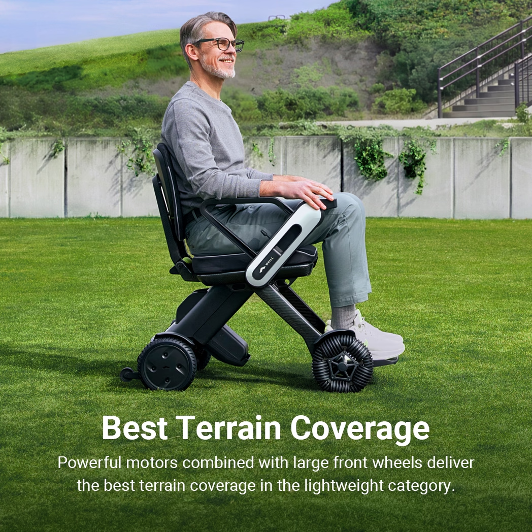 Man using a WHILL Model C Lite power wheelchair with white arm covers on grass, with manufacturer terrain-feature text overlay