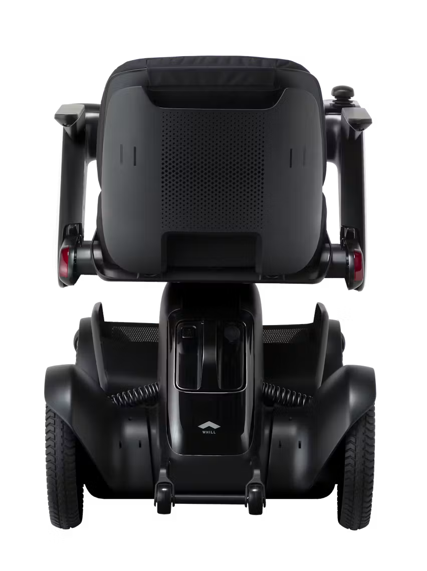 WHILL Model C2 power wheelchair, complete rear studio view