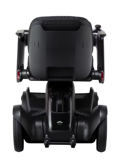 WHILL Model C2 power wheelchair, complete rear studio view