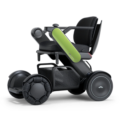 WHILL Model C2 power wheelchair with light green arm covers, front three-quarter studio view
