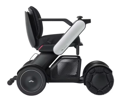 WHILL Model C2 power wheelchair with white arm covers, complete side studio view