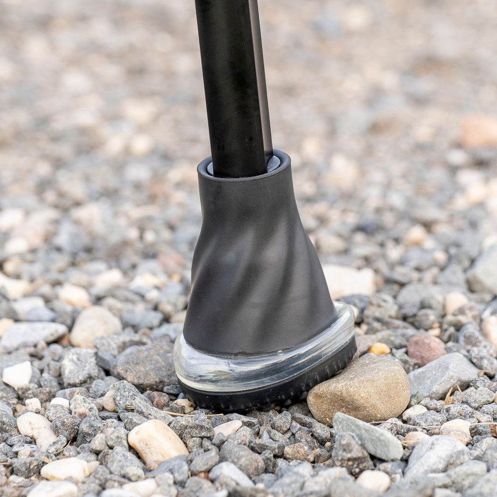 Close-up of the flexible Drive Air-Crutch tip adapting securely to outdoor pavement for safe footing.