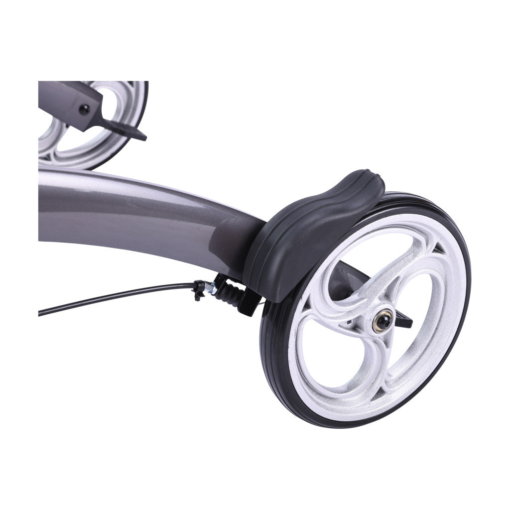 Close-up of the durable large front wheel on the grey Drive Medical Elevate Upright Walker, designed for smooth indoor and outdoor mobility.