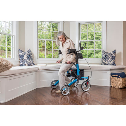 Senior man using the Drive Elevate Upright Walker indoors for stability and support.