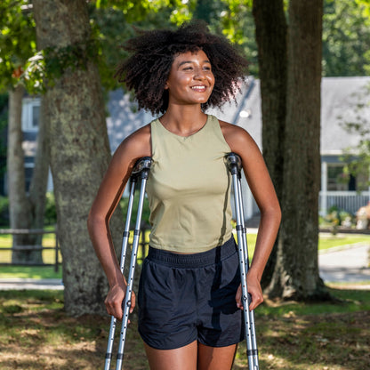 Front view of a woman using the Drive Air-Crutches for stable, comfortable, and stylish outdoor mobility.