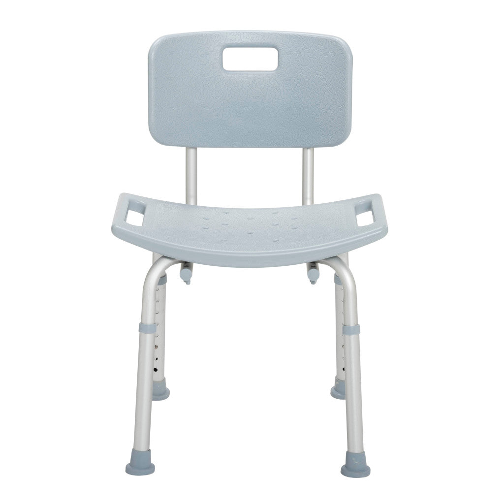 Straight front view of the Drive Medical shower chair highlighting the wide seating surface and drainage holes.