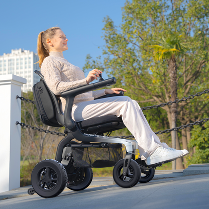 Robooter E80 carbon fibre power wheelchair shown outdoors