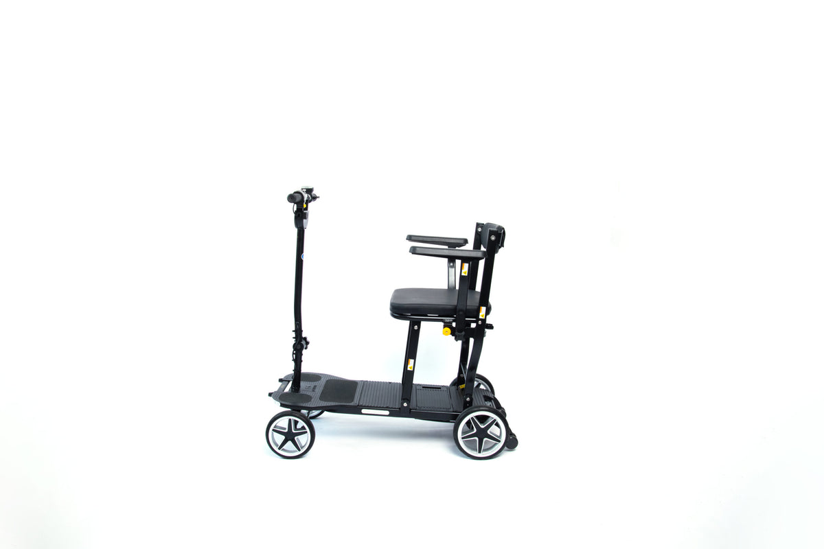 Rear three-quarter view of the eFOLDi Compass frame and seat, without optional armrests