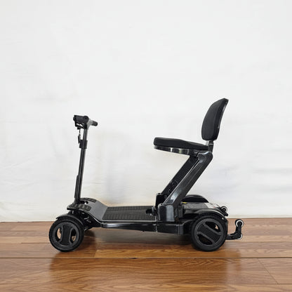 Go Go Carbon fiber mobility scooter designed for tight turning radiuses and easy indoor maneuverability.