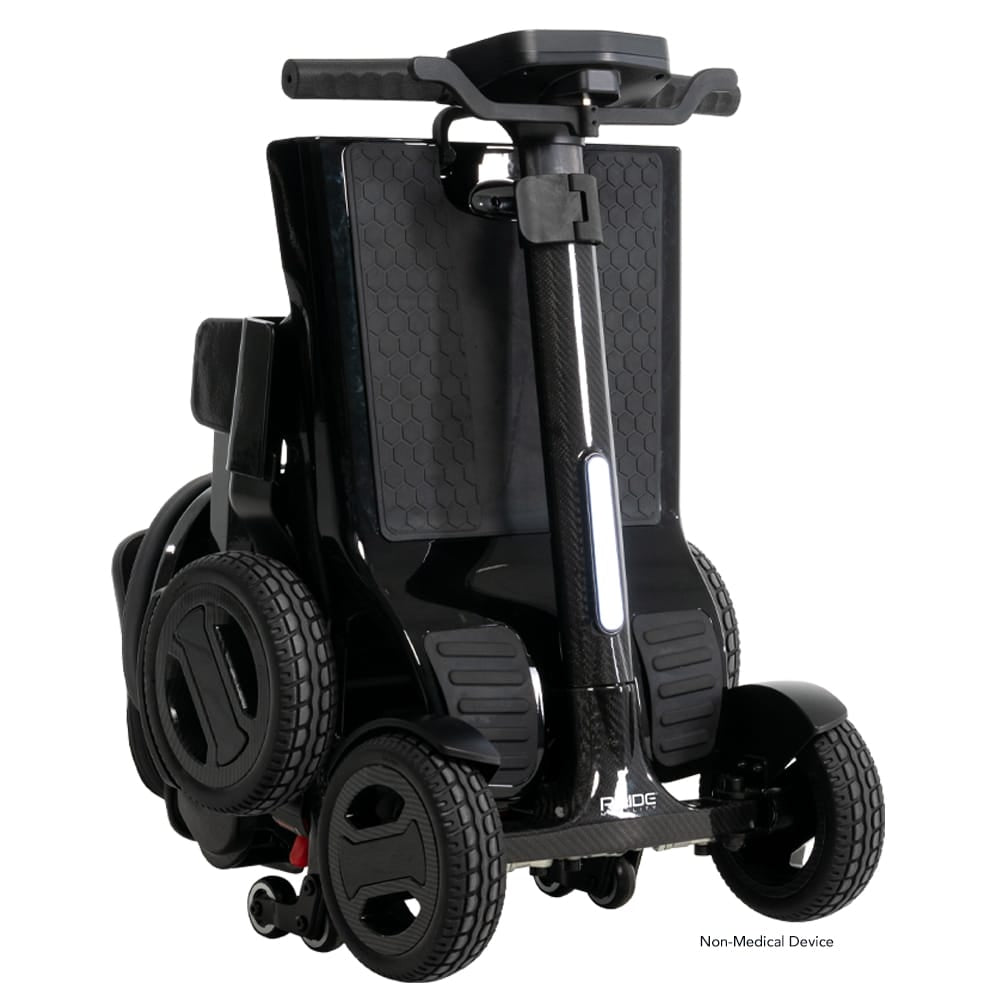 Go Go Carbon mobility scooter folded into a compact upright position for easy lifting and transport.