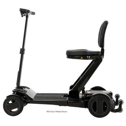 Side profile of the Go Go Carbon travel scooter highlighting its sleek carbon fiber frame and seating.