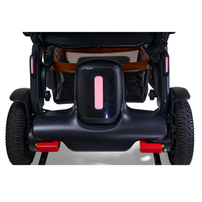 Rear folded view of the Golden Ally Pro GP304 power chair showcasing the integrated red safety taillight.