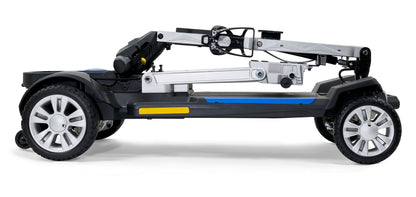 The blue Golden Technologies Buzzaround CarryOn travel scooter folded completely flat for ultra-compact transport and storage.