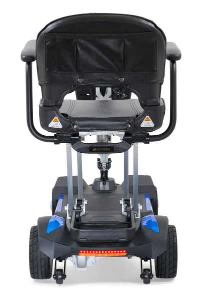 Rear view of the blue Buzzaround CarryOn mobility scooter showing the sturdy wheelbase and backrest.