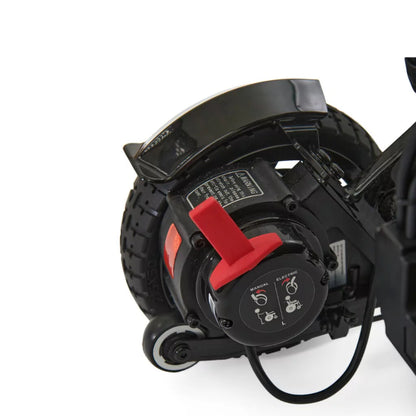 Close-up of the durable rear drive wheel, powerful motor, and safety anti-tip wheel on the Golden Technologies Cricket GP302.