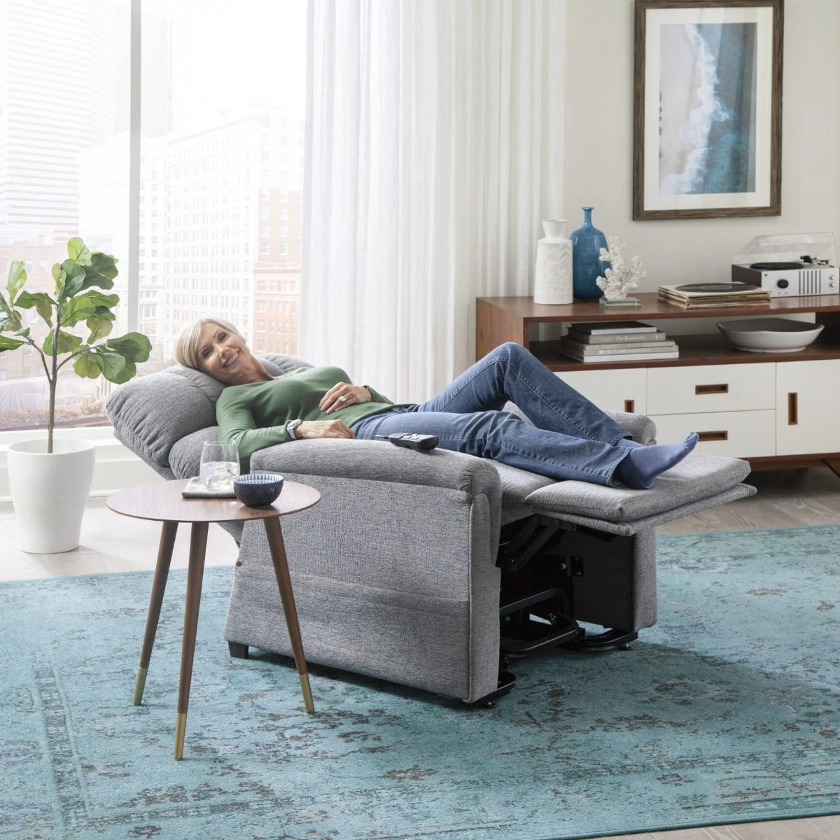 Woman resting in the zero gravity position of her Golden MaxiComforter PR535 lift chair