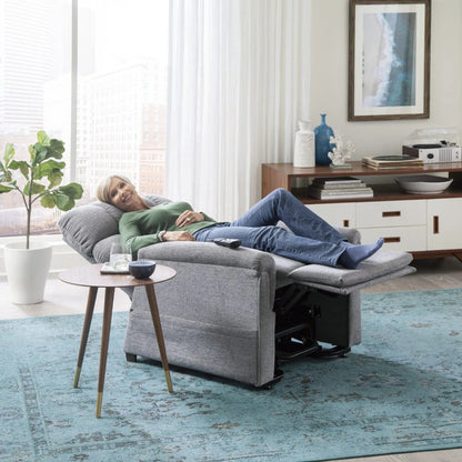 Woman resting in the zero gravity position of her Golden MaxiComforter PR535 lift chair