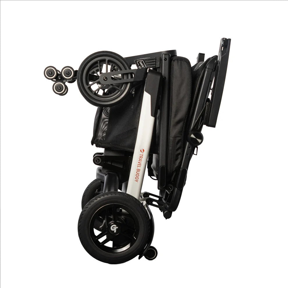 Travel Buggy Grand Tourer GT folded flat for convenient transport in a car trunk.