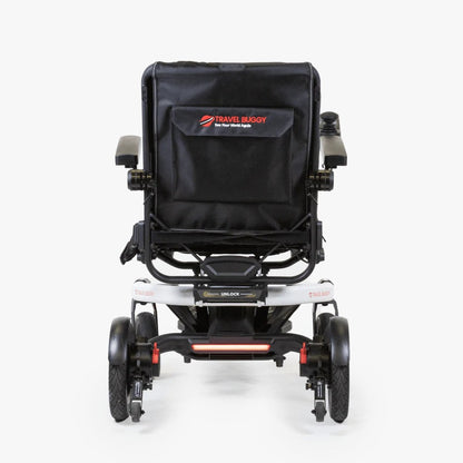 Rear view of the Travel Buggy Grand Tourer GT power wheelchair showing the wide footplate.