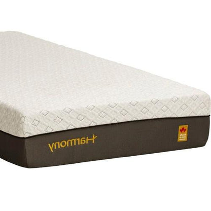 Close-up of the premium fabric cover, zipper detail, and Harmony branding on the corner of the Relax mattress.