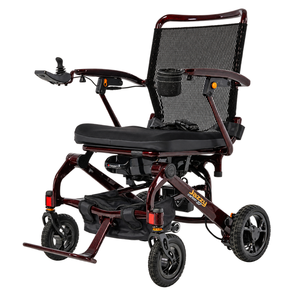 Pride Jazzy Carbon 27 power wheelchair in Black Cherry, front three-quarter view