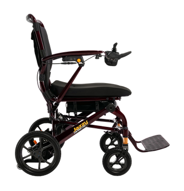Pride Jazzy Carbon HD power wheelchair in Black Cherry, unfolded side studio view