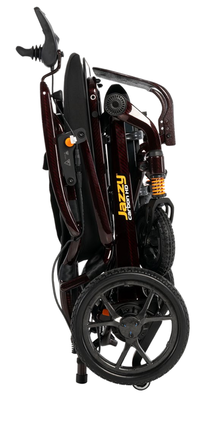 Pride Jazzy Carbon HD power wheelchair in Black Cherry, folded for transport