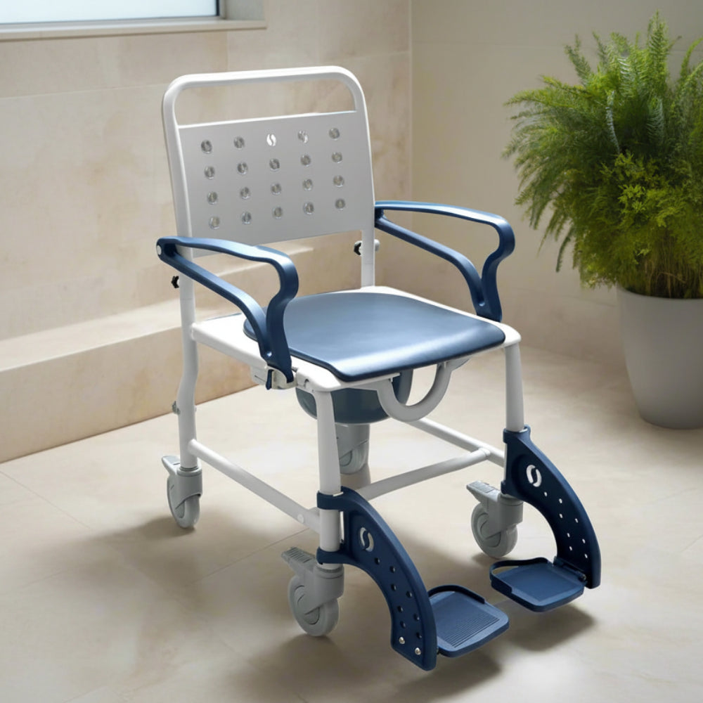 The MOBB 3-in-1 Shower Commode Wheelchair placed neatly in a bright, modern residential bathroom setting.